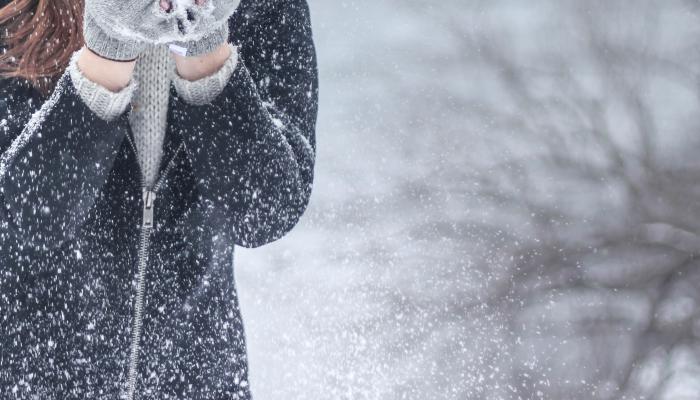 Woman in snowy winter.